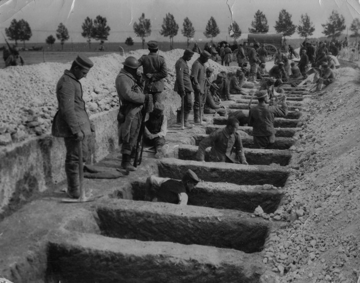 German prisoners burying French and German dead near Peronne