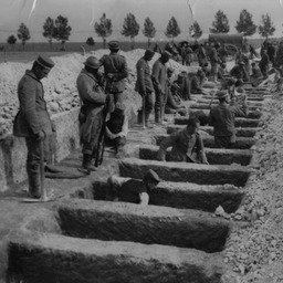 German prisoners burying French and German dead near Peronne